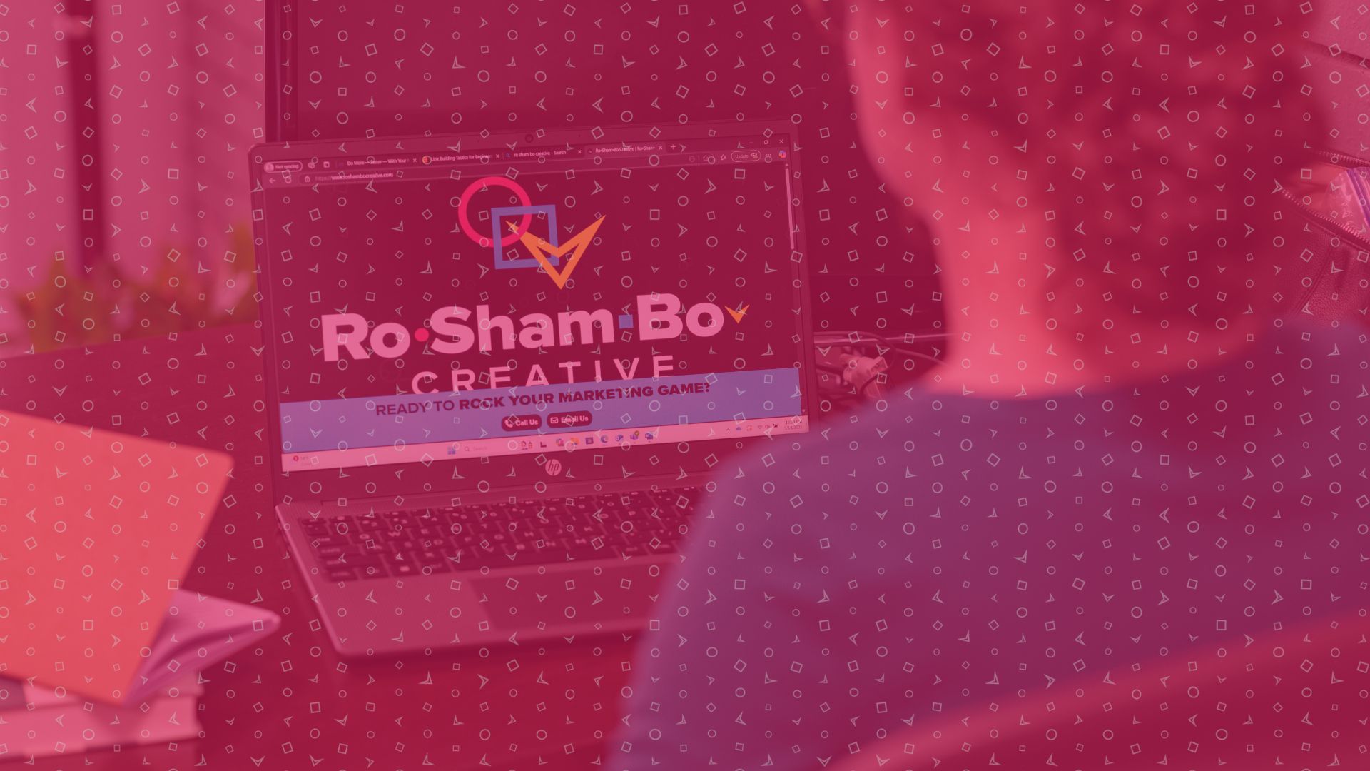 Image of someone looking at the RoShamBo Creative site.