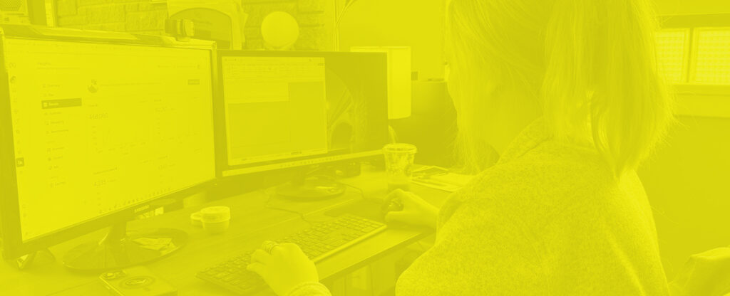 Image of RoShamBo Creative employee working on social campaigns.