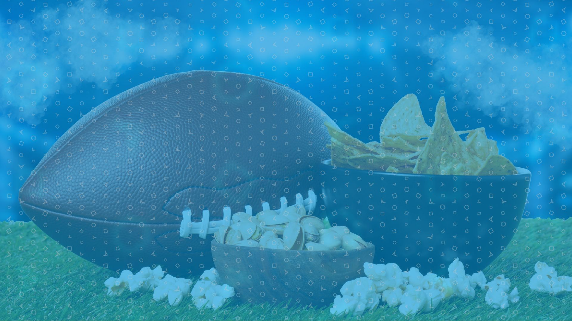 Image of Football with Super Bowl snacks.