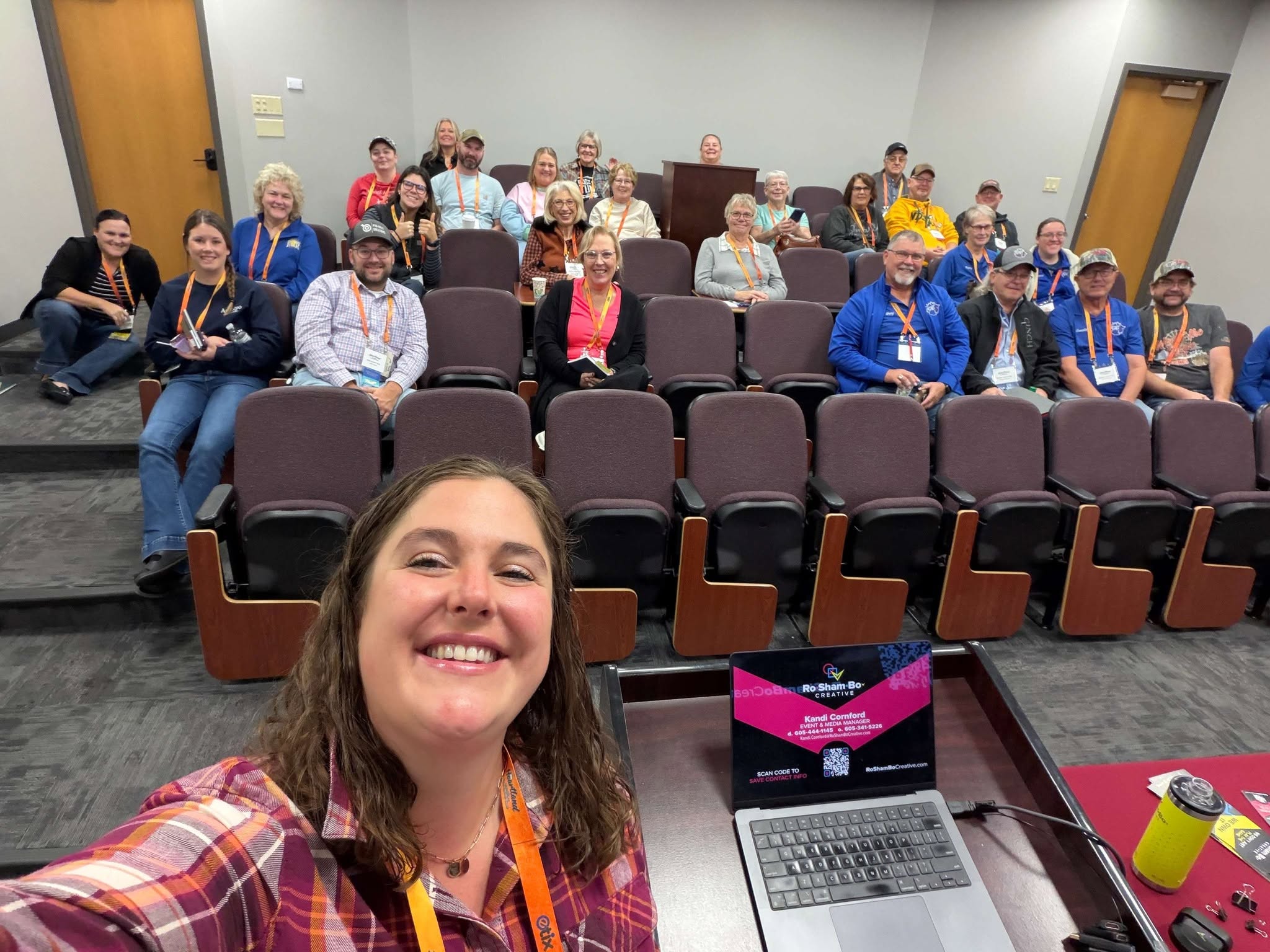 Image of Kandi talking at conference