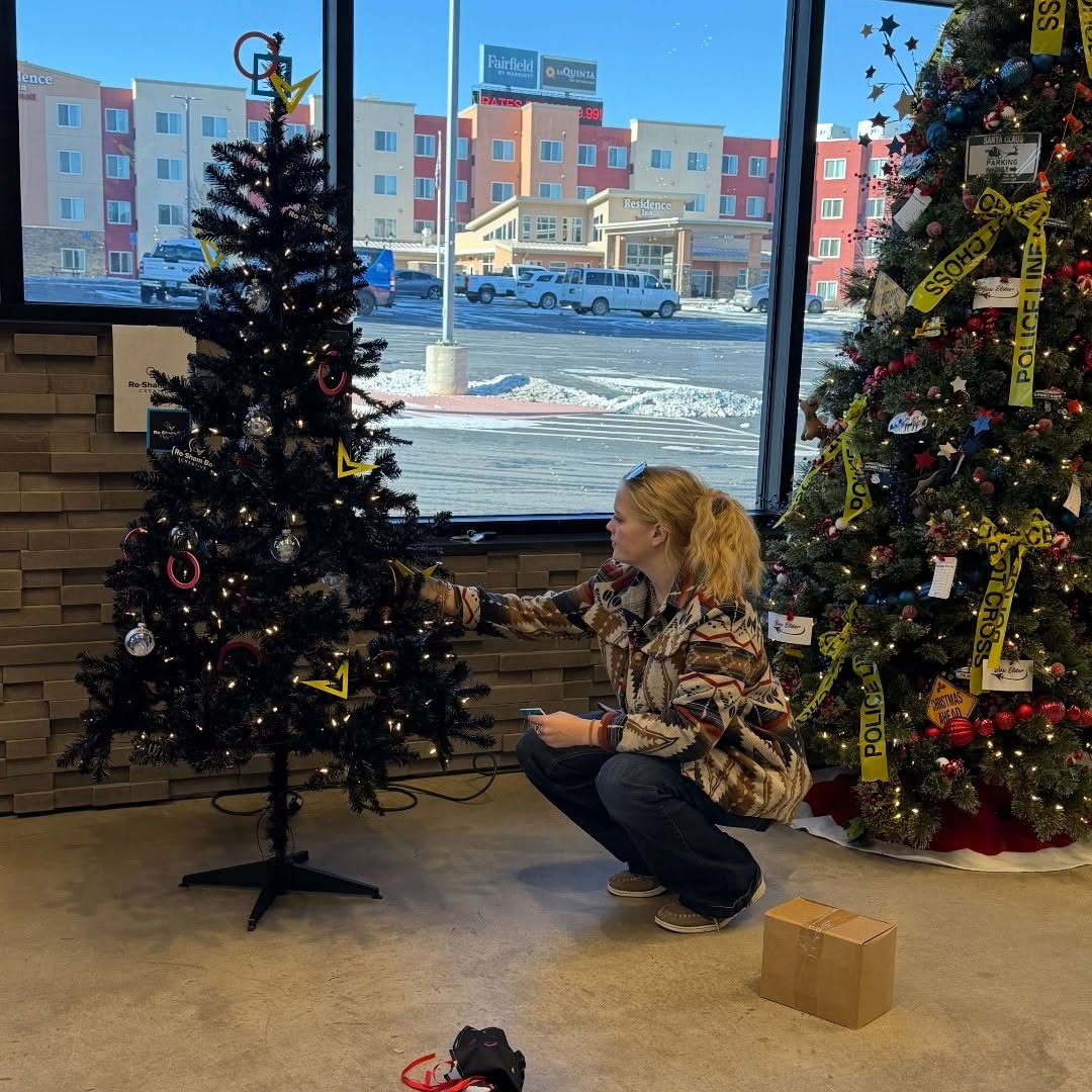 Sam setting up RoShamBo Creative tree at Box Elder Events Center